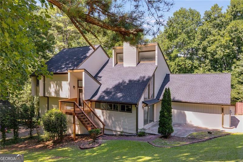 Price Change! Great Location!!! Come and see this spacious four bedroom two full baths and a 2 half bath with a Finished Basement. Home located in East Cobb. "Well-maintained" and "move-in ready" This gorgeous home is perfect for any family. There is plenty of space to grow and the finished basement offers a great opportunity for a game room, play room, office, or extra storage. Beautiful hardwood floors. Great neighborhood - featuring an established, quiet cul-de-sac and several family-friendly parks within 5-10 minute drive.