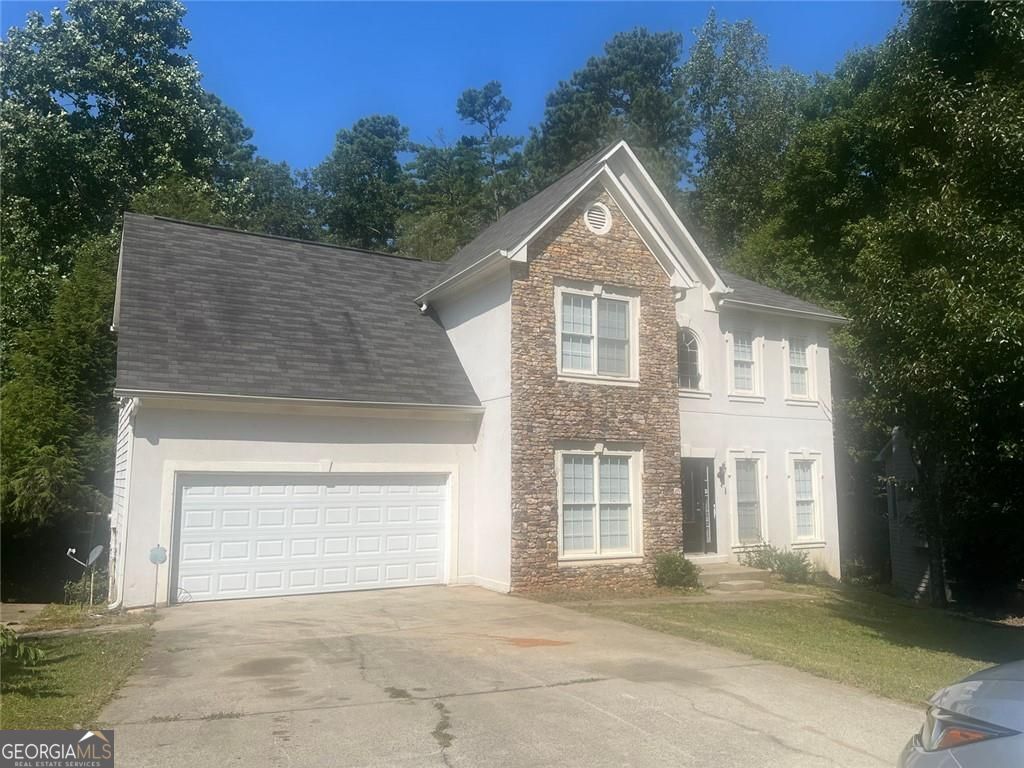 Welcome to 158 Kenley Ct, located in the sought-after Magnolia South subdivision in Marietta! 4 bedroom, 3.5 bathroom home offers plenty of living space with the perfect blend of comfort and convenience. Step inside to a bright and open layout ideal for both relaxation and entertaining. The main level features a spacious family room, modern kitchen, and dining area that flows seamlessly for everyday living.The finished basement provides additional space-perfect for a media room, home office, or guest suite. Upstairs, you'll find a large primary suite with a private bathroom, along with generously sized secondary bedrooms. Outside, enjoy the peaceful community setting while being just minutes from shopping, dining, parks, and major highways for an easy commute.