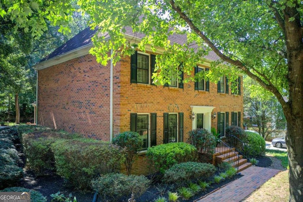 Photo of 854 Newcastle Drive SW, Lilburn, GA 30047 (MLS # 10709041)