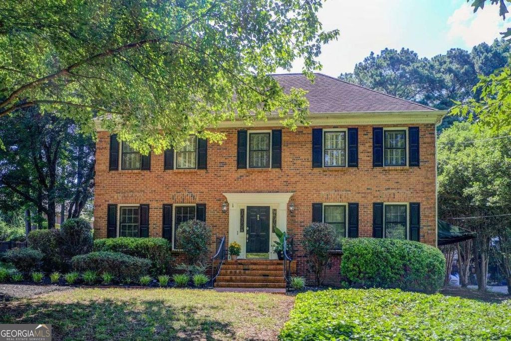 Photo of 854 Newcastle Drive SW, Lilburn, GA 30047 (MLS # 10709041)