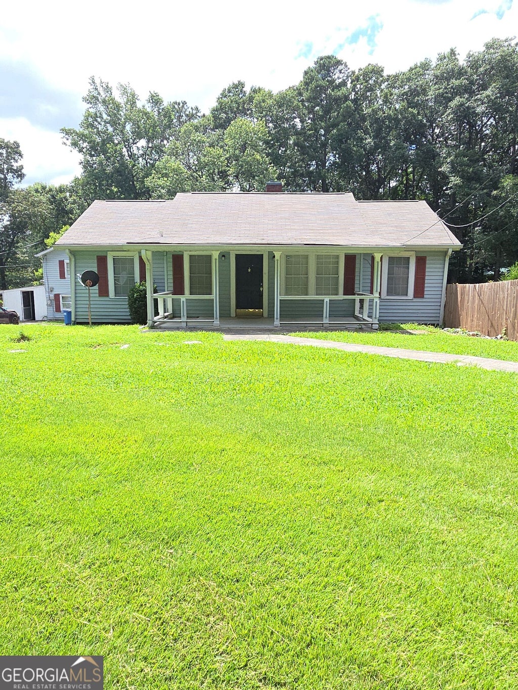 Photo of 6819 Mark Turner Road, Lithia Springs, GA 30122 (MLS # 10839939)