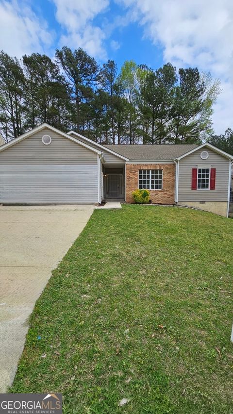Photo of 5760 Old Carriage Drive, Atlanta, GA 30349 (MLS # 10637743)