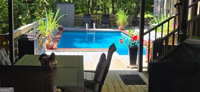 Photo of 346 DOCK LATHEM Trail, Ball Ground, GA 30107 (MLS # 10847242)