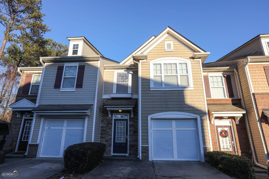 Beautifully updated 3 bed/2.5 bath Townhome for Sale! Well maintained and clean! Spacious, open floorplan with all Hardwood floors on Main and Updated light fixtures. Bright, sunny eat-in Kitchen with White cabinets, Stone countertops, S/S appliances, and large Pantry. Spacious Great room with Fireplace. Oversized Master suite with Sitting area includes ensuite with extended vanity, Separate Shower & Soaking Tub, and Big walk-in closet. Two large secondary bedrooms upstairs. Gated community in great location. Close to Hwy, restaurants, shopping and more!! Open to investors. NO rental restrictions!!