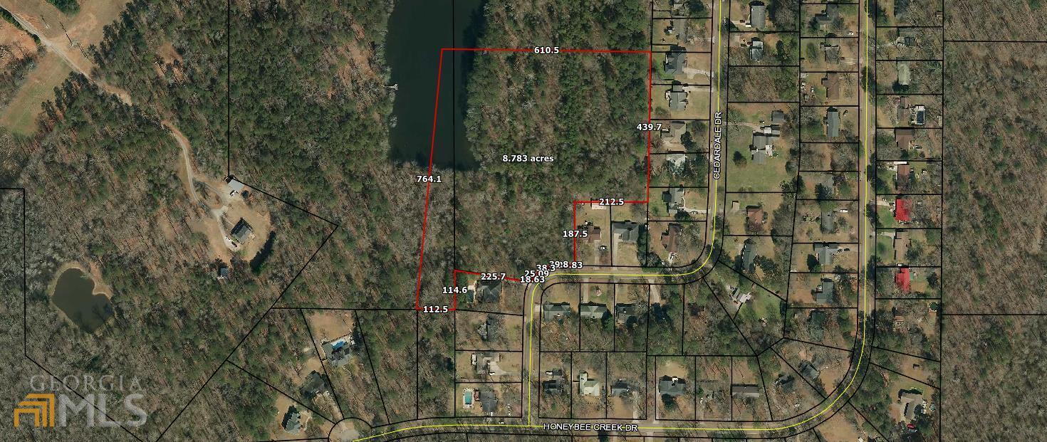 8.73+ acre purchase. Up to 17 total acres available with lake frontage. This is a very private estate size lot close to city limits. Additional tract available joining this tract with app. 400 feet lake frontage also. City sewage is available with the smaller tract.