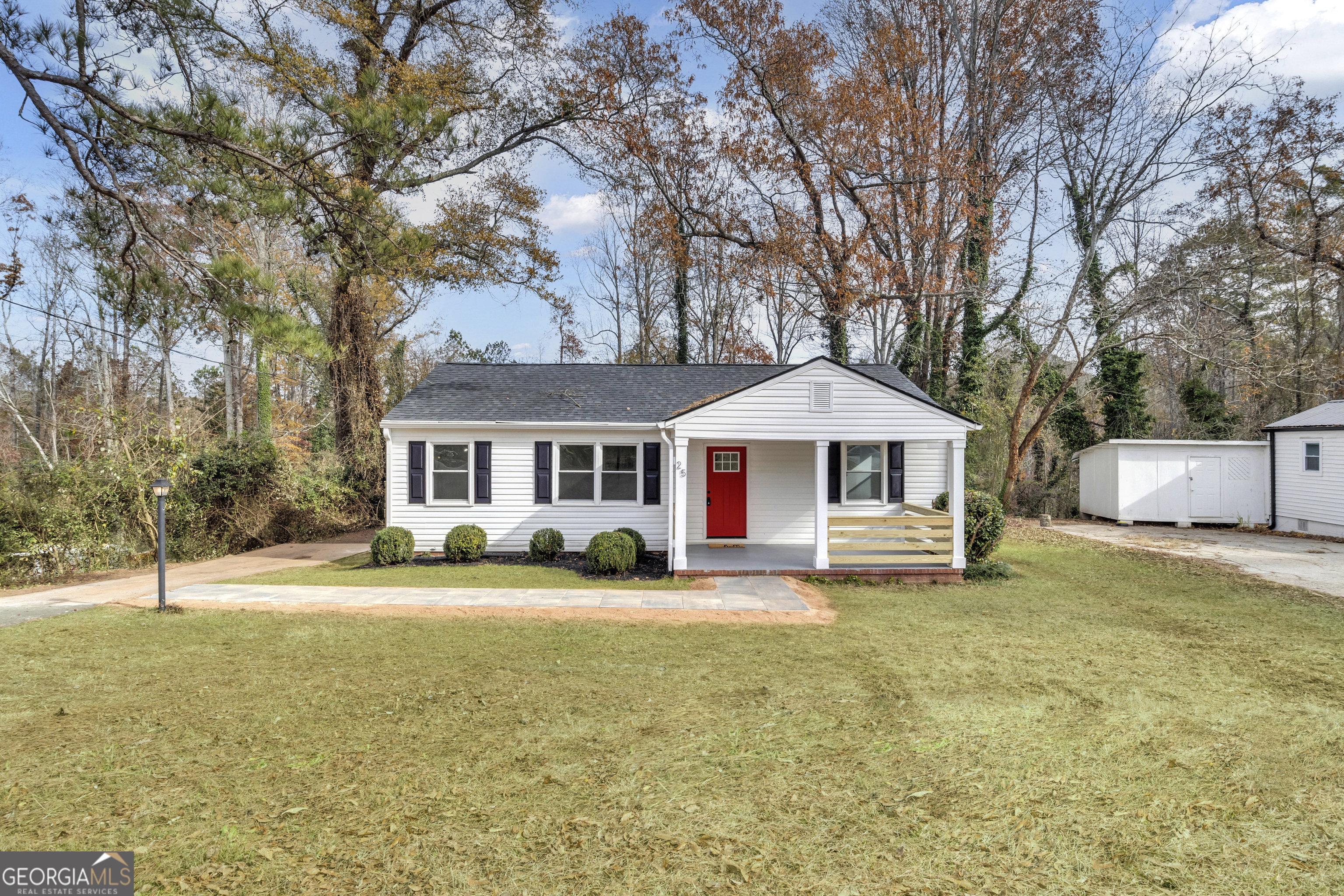 Location, Location, Location! Welcome to this beautifully renovated ranch cottage, located in a well-established neighborhood next to Newnan High School. This home effortlessly blends modern updates with original classic charm, offering both comfort and style. The exterior boasts a large front porch, perfect for outdoor living and relaxation, as well as a newly built back deck that leads to a private patio area, ideal for entertaining. Inside, you'll find 3 spacious bedrooms with ample closet space, and an updated bathroom featuring a new vanity, tile flooring, modern fixtures, and a sleek new shower. The open-concept living and dining area flows seamlessly into the galley kitchen, which has been thoughtfully updated with new quartz countertops, stainless steel appliances, and stunning tile backsplash. The kitchen features tile flooring and a convenient pantry for extra storage. Newly refinished hardwood floors enhance the living and dining areas, adding to the home's timeless appeal. Additional updates include updated electrical, HVAC, and plumbing systems, along with newer windows, providing peace of mind for the new owner. The home is equipped with two storage closets, maximizing usable space for families. The property also includes termite protection, with the bond being transferred at closing. Situated just minutes from Historic Downtown Newnan and Ashley Park, this home is conveniently close to shopping, dining, and entertainment. Whether you're exploring the vibrant downtown area or enjoying a day at the local shops, everything you need is right at your doorstep. This Agent-Owned Property is move-in ready and waiting for you to make it your own. Schedule your showing today to experience the perfect blend of classic charm and modern living! This property is renting for $1950 with tenant paid utilities. Please do not disturb tenant.