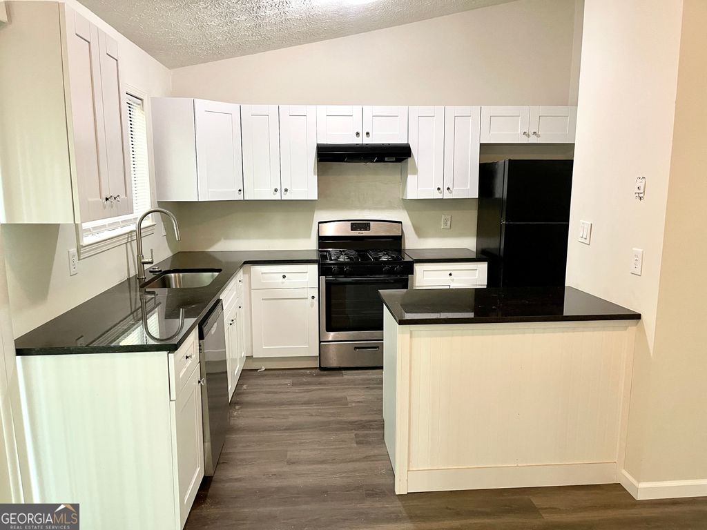 Photo of 5165 Fairforest Drive, Stone Mountain, GA 30088 (MLS # 10706421)