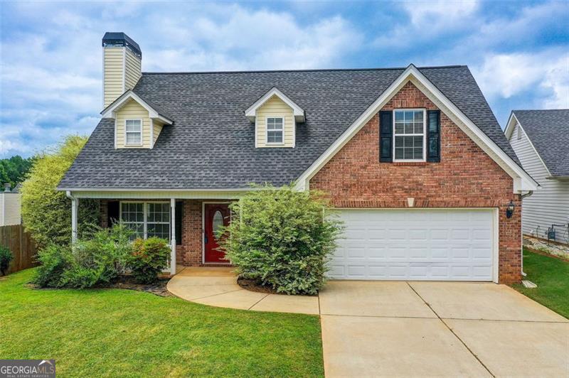 Welcome home to a charming, move-in-ready residence on a quiet cul-de-sac in Locust Grove. This beautifully maintained home features a light-filled main bedroom with tray ceiling and ceiling fan, and generous closet space. Upstairs you'll find a spacious bonus room-perfect for a home office, playroom, or media retreat-also equipped with a ceiling fan and refreshed finishes. The brick exterior, welcoming front porch, and two-car garage add to the home's curb appeal and functionality. Just minutes from Tanger Station Park and the vibrant Locust Grove Historic District, this property offers the ideal blend of privacy, comfort, and community charm.