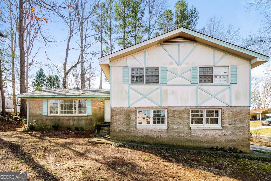 Fixer Upper located in Morrow. This 4 bedroom home is ready to make your own! Two car garage and a great location. Convenient to shopping and I75. Tour this home today and dream up the possibilities. Sold as-is, seller will not make any repairs.