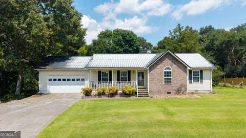 Photo of 100 Walraven Way SE, Calhoun, GA 30701 (MLS # 10827805)