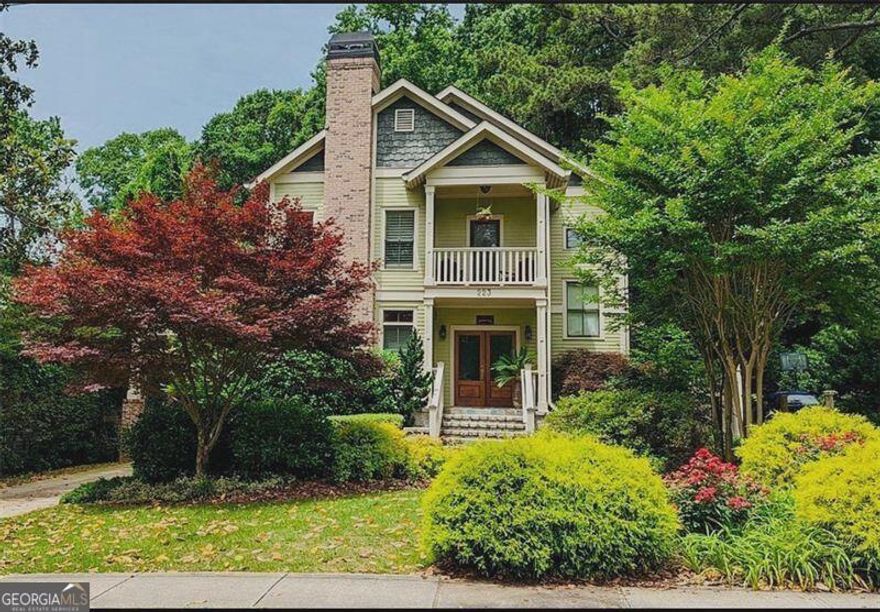 This 4-bedroom, 4-bath custom-built home in Decatur's Winnona Park neighborhood blends timeless craftsmanship with modern comfort. The exterior showcases Hardie plank siding, brick accents, granite steps, and lush landscaping with Japanese Maples and Climbing Jasmine.  The home is designed by award-winning architect Richard Stevens.     Inside, you will find over 4,500 sq ft of living space with hardwood floors, custom built-ins, and abundant natural light. The main level offers a private office, formal dining room with coffered ceilings, full bath, and a chef's kitchen featuring custom cabinetry, farmhouse sink, granite counters, stainless steel appliances, gas range, and a wine fridge. The family room opens to wraparound decks and a covered porch with Bermuda shutters for seamless indoor-outdoor living.    Upstairs, the owner's suite boasts a custom walk-in closet and spa bath with clawfoot tub, while three secondary bedrooms share a spacious bath with double vanities. A third-floor loft sits under a skylight and provides flexible living space for a sitting area, additional office or playroom.  The second level is also host to a private terrace.      Downstairs in the fully finished basement with private entry expands the home's livable space and offers incredible versatility.  Thoughtfully designed with a separate entrance, built in seating nook and storage rooms.   It features a theatre room, a comfortable sitting room, and a full bathroom, creating a self-contained living area.  Potential includes serving as guest suite-perfect for hosting visitors, a family area - media or playroom or even supplemental income opportunity.     The fully finished basement is a separate oasis already crafted for entertaining or to serve as a retreat.    Enjoy a fenced backyard, covered parking with skylights.  Walk to the historic heart of downtown Decatur Square, highly ranked schools, historic parks, shops, and notable restaurants.  This home is a marriage of vintage, charm and modern living wrapped in the ambiance of a beautiful neighborhood.   Walking distance to downtown Decatur and only five miles to downtown Atlanta with close proximity to the Marta.