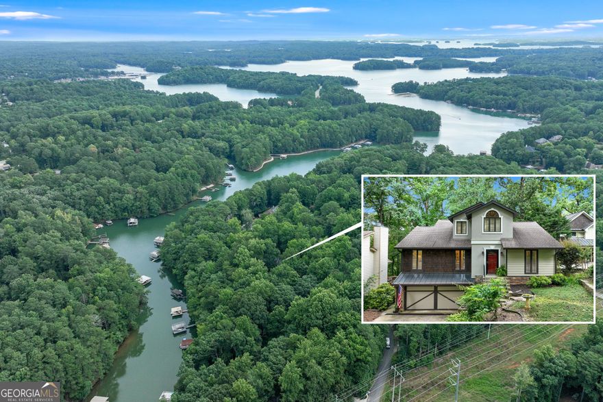 Experience tranquility and the feeling of a daily vacation in this warm and inviting lakeside home with a private, single slip dock with a party deck. Welcome to this beautifully maintained 3 bedrooms, 4 baths lake home with 2 covered decks, a finished basement, new roof (2025), gorgeous landscaping, and peaceful lake views where your dream, lakefront lifestyle becomes a reality. The charming gourmet kitchen features a slate floor, granite countertops, custom cabinetry, an island with a maple countertop and bar sink, a 4 burner gas range with griddle, a cozy breakfast area, and a roomy pantry, making it a chef's delight. The adjacent dining area provides the perfect setting for both intimate family dinners and festive gatherings with friends. The family room invites relaxation with its cozy stone gas fireplace, built-ins, and doors that open onto a covered wrap around deck-perfect for summer barbecues, and outdoor entertaining. The main level also boasts a luxurious primary suite with 2 spacious closets, a spa-inspired ensuite bath with a 5 head shower, an elegant, clawfoot soaking tub, and a custom window. An additional guest bedroom and adjoining full bath will comfortably accommodate weekend guests or family. Upstairs, a full bath and a versatile flex area provides ample space and storage for family, guests, or a home office. The finished basement offers even more living area, additional office space, along with a convenient, large laundry room, full bath and a second covered deck. The double car garage contains a work bench and shelving for tools and hobbies. The outdoor living spaces are truly exceptional. A stone and timber lined path leads to your private single slip dock with a party deck, including power, where endless adventures await. The shoreline has been enhanced with rip rap. You're enjoy the peace of the quiet cove. Once the day is over and you're making your way to your lake home, you'll appreciate that the path is lit with solar and electric lighting. You'll love to gather around the firepit area as you relive the memories of the day. Thoughtfully landscaped gardens burst with color throughout the seasons, while mature trees offer shade and privacy. Life on Lake Lanier is about embracing a lifestyle of relaxation, recreation, and connection. Spend your days swimming, fishing, or boating to the nearby restaurants. Host unforgettable gatherings on your deck, or enjoy quiet evenings by the fire. Whether you're seeking a year-round residence, a seasonal retreat, or a legacy property for generations to come, this lakefront home is your perfect math. New Gangplank on order for dock. Boat is negotiable with strong offer. Schedule a private tour today.