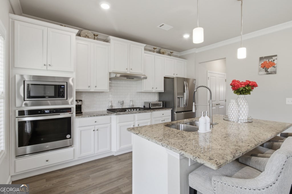 Photo of 114 Henson Farm Dr, Loganville, GA 30052 (MLS # 10867452)