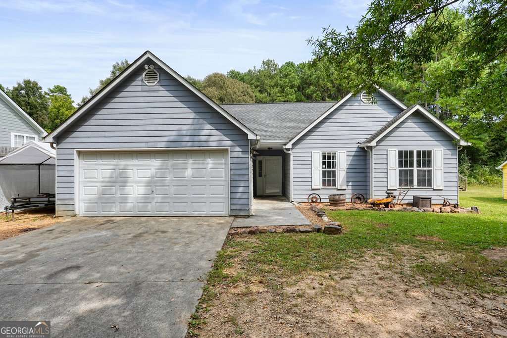Welcome to this charming 3 bedroom, 2 bathroom ranch home in the Plantation Place subdivision. Situated on over a half-acre lot, this property provides plenty of space both inside and out. The large fenced backyard is ideal for pets, play, or entertaining, while the 2-car garage adds convenience and extra storage. Inside, you'll find a functional floor plan that's ready for your personal touches. The primary suite includes its own en suite bathroom for added comfort and privacy. Major systems are already in place with the roof and water heater only 7 years old. Don't miss your chance to own a home at an incredible value. .