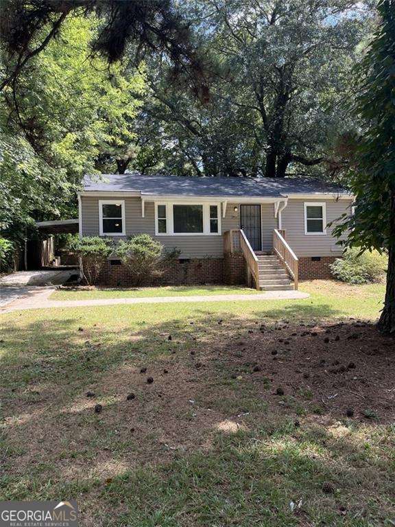 Location is everything, and this 3-bedroom, 2-bath bungalow is right where you want to be! Nestled in the heart of Atlanta's vibrant Westside, 1228 Elizabeth Avenue SW is a blank canvas ready for your vision. With over 1,100 sq. ft. of living space, this home offers endless possibilities whether you're looking to create your personal paradise or an investment opportunity. The single-level layout provides a spacious living area, flexible floor plan, and room to reimagine. Just minutes from Downtown Atlanta, you'll enjoy easy access to parks, shopping, dining, and all the city has to offer. No HOA. Convenient location near major highways makes commuting a breeze. Don't miss your chance to unlock the potential in this classic Atlanta bungalow!