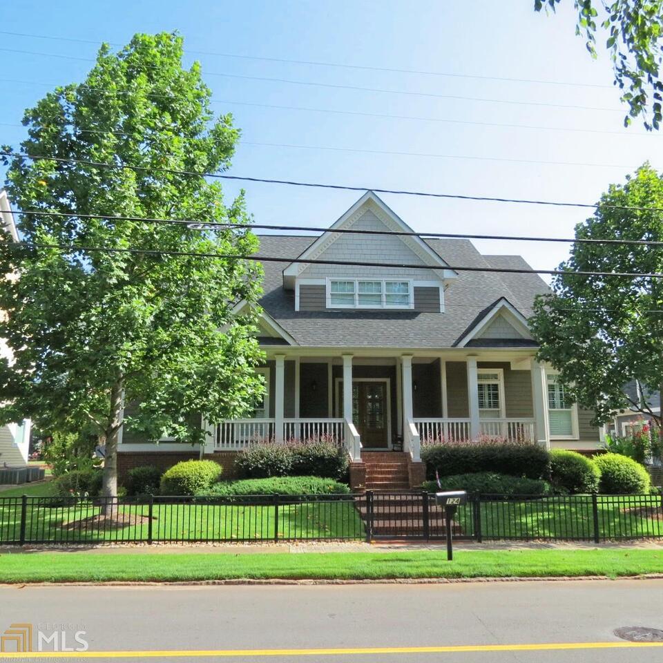 On this tree lined street in the heart of McDonough-Over 3400 SQ FT of elegant living from a time gone by-Walk up to the freshly painted front porch w/Brick Pavers-Stained wood/glass front doors-open to 2 story Foyer & Dining RM-Loads of Plantation Shutters/Wood Trim/Hardwood Floors/Crown Molding/Smooth Ceilings/Tall Doors-Great Rm offers raised hearth Brick Firepl w/gas logs-BRAND NEW Gourmet Kit w/Granite counters/White Bead Board cab/Farm House Sink/Island/Pot Rack/Pantry/Gas Cook Top/Built in Microwave/DW-HUGE Master suite on the Main w/Walk in Closet-Zen like Master Bath w/Tile floors/Granite Counters/Dual Vanities/Jetted Tub/Over sized Shower-Additional BR on main w/BATH-2BR/2BATH & loft/den-Screened porch w/views of park-Alley entry way 2 car garage!