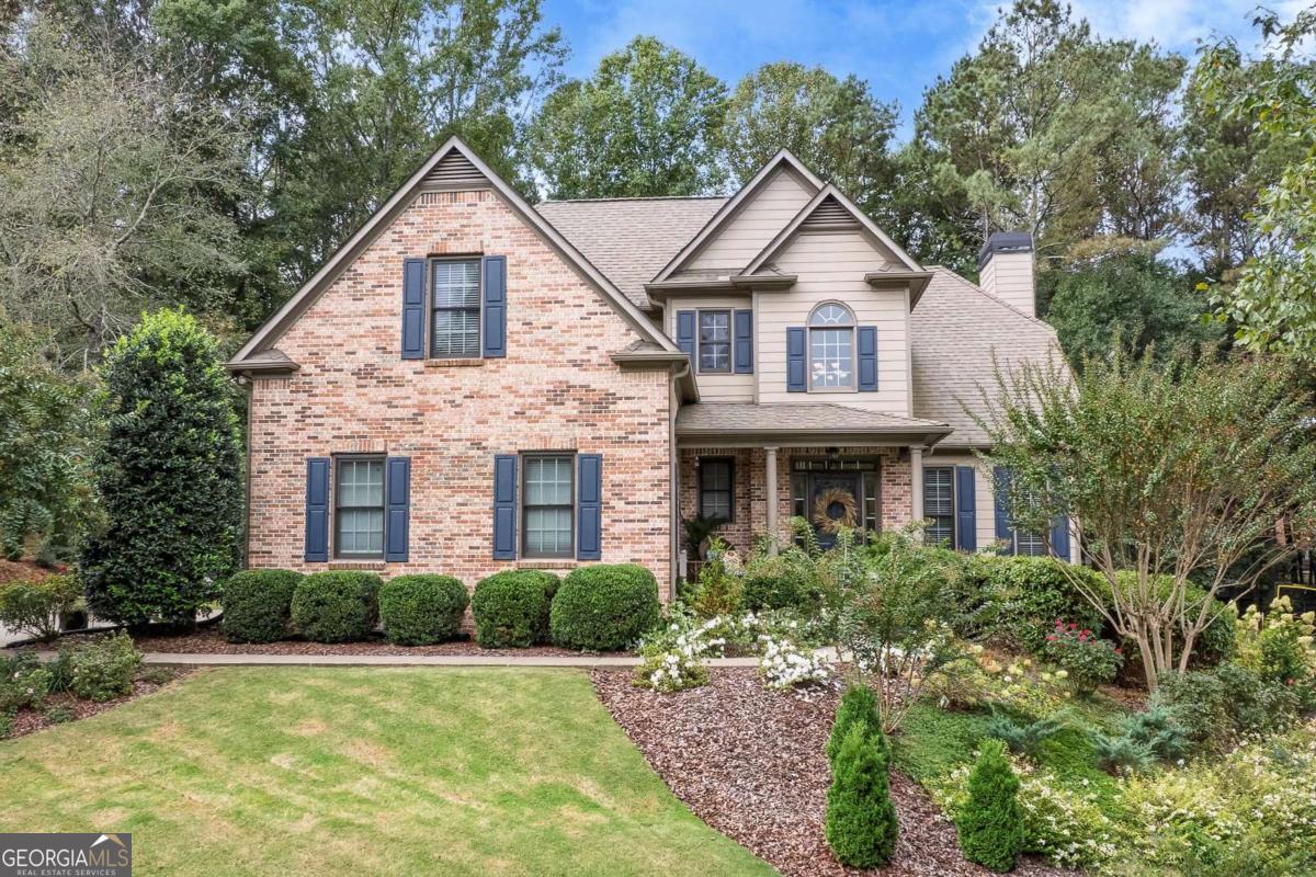 Welcome to this beautiful primary-on-main home, perfectly situated on a large lot on a cul-de-sac street in the sought-after community of The Preserve at Etowah. This neighborhood is known for its spacious lots and wonderful amenities, including a pool, tennis courts, playground, and a picturesque lake. The home features a welcoming front porch and a two-story entry foyer leading to a spacious dining room perfect for gatherings. The vaulted family room with fireplace opens to the kitchen, which boasts wood cabinets, stainless steel appliances, and a bright breakfast area for casual meals. Step out to the screened porch, a favorite spot to relax while overlooking the beautifully landscaped, fenced backyard-plenty of space for playing and gardening. A deck off the porch offers the perfect setting for grilling and alfresco dining. The main-level primary suite is a true retreat with a tray ceiling, private deck access, and a spa-like bath featuring a soaking tub, glass shower, double vanity, and walk-in closet. A convenient laundry room and guest half bath complete the main level. Upstairs, a versatile loft provides space for reading, studying, or relaxing, while three spacious bedrooms share a well-appointed hall bath. The partially finished terrace level offers endless possibilities with heating, air, and a bathroom stub already in place. Recent updates provide peace of mind, including new carpet, refinished and added hardwoods, fresh interior paint, a new hot water heater, a replaced water supply line, and a septic system pumped in 2023. Move-in ready and lovingly maintained, this home is ready for its next owners to enjoy and make memories in.