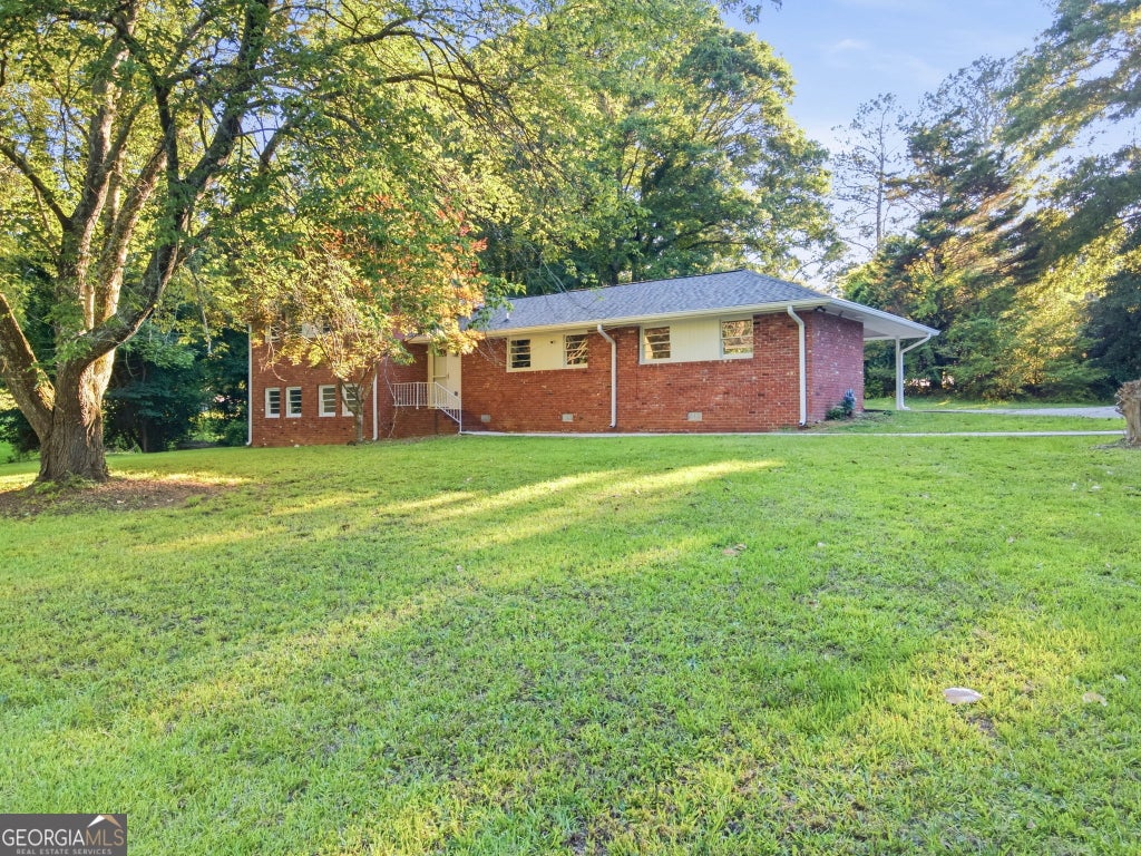 Photo of 180 E Greenwood Drive, Carrollton, GA 30117 (MLS # 10781616)