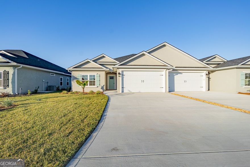 Welcome to this charming 3-bedroom, 2-bath villa home, thoughtfully designed for both comfort and convenience. Upon entering, you'll be greeted by beautiful wood-look tile flooring throughout the main living areas, adding a touch of modern elegance. The cozy bedrooms feature plush carpeting, creating a relaxing atmosphere for rest and relaxation.      The U-shaped kitchen is a standout, offering an abundance of cabinetry, elegant granite countertops, and stainless-steel appliances-ideal for meal prep and storage. With plenty of counter space, it's perfect for cooking and entertaining. The home also boasts two spacious living areas, providing flexibility for gatherings, family time, or simply unwinding in separate spaces.      Tray ceilings and crown molding enhance the main living areas, adding an extra layer of sophistication to the home. The master suite offers a luxurious retreat, complete with dual vanities, a soothing soaker tub, a walk-in shower, and two large master closets to keep everything organized.      Additional highlights include a two-car garage and wire shelving in the closets, making storage a breeze. This home blends modern design with practical features, offering everything you need in a beautifully crafted space. Don't miss the chance to make this gem your own!