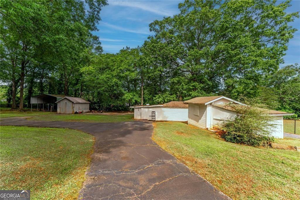 Photo of 4225 Atlanta Street, Powder Springs, GA 30127 (MLS # 10766108)