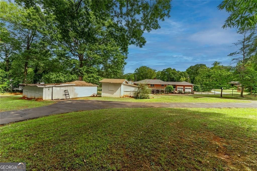 Photo of 4225 Atlanta Street, Powder Springs, GA 30127 (MLS # 10766108)