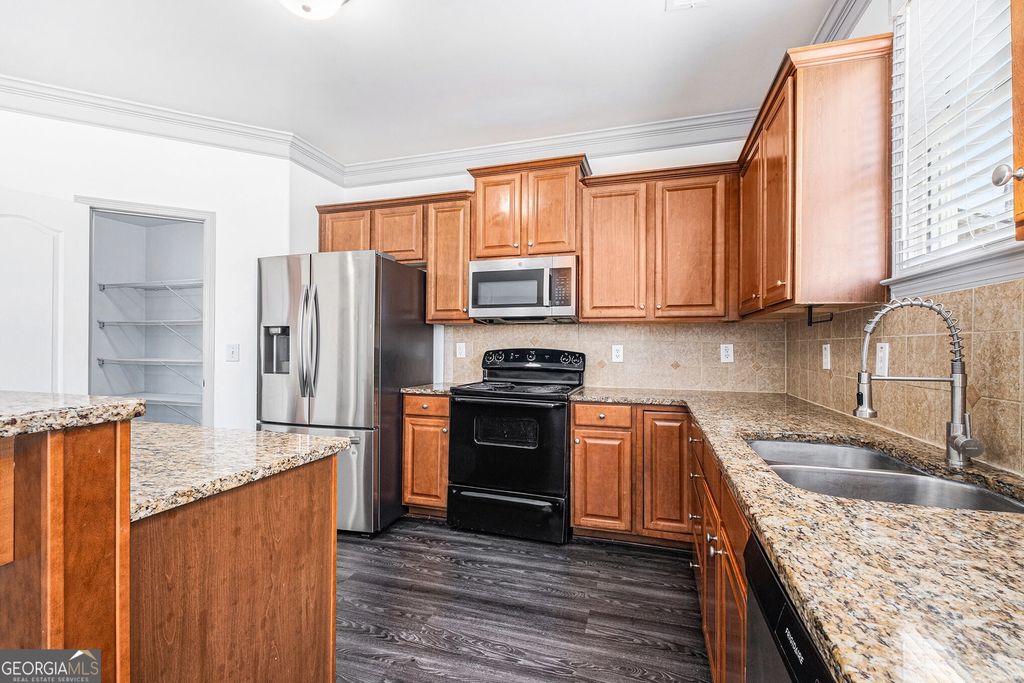 Photo of 1638 Great Shoals Cir, Lawrenceville, GA 30045 (MLS # 10668094)