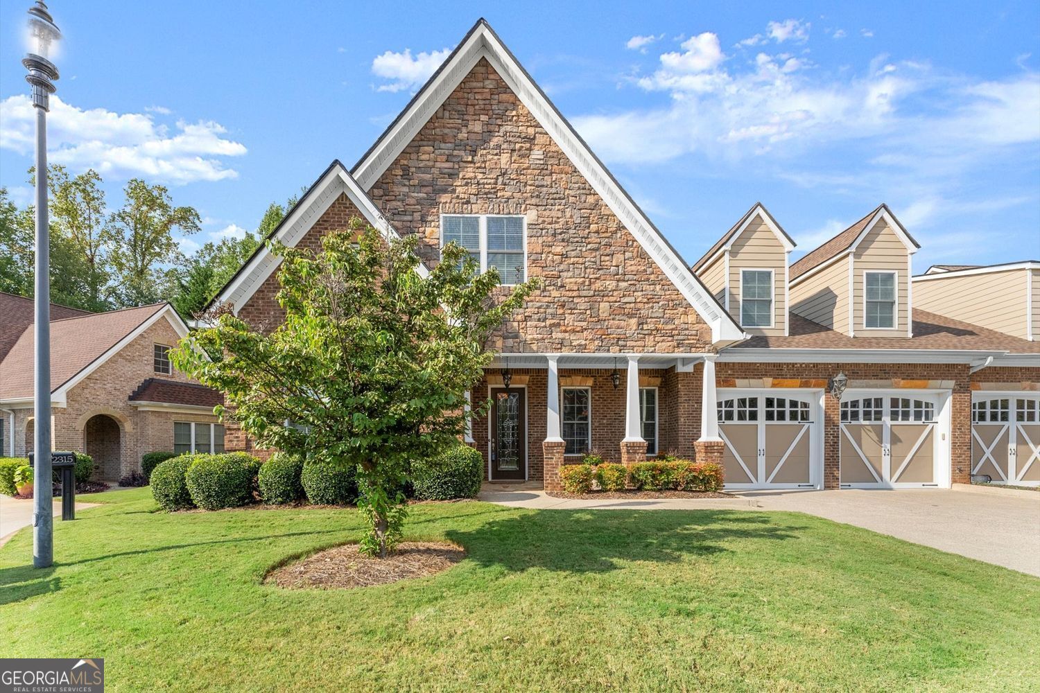 This luxurious home is located in the desirable community of The Oaks at Sandy Springs in East Cobb. This home has been meticulously maintained, it features two levels serviced by a private Elevator. The main level is designed for both comfort and elegance. The living room includes a fireplace, coffered and beamed ceilings, crown molding, and built-in selving, creating an inviting atmosphere for relaxation or entertaining. The eat-in kitchen is a chef's dream with stone countertops, a custom range hood, stylish backsplash, bar seating, and plenty of cabinet space. An elegant dining room with a tray ceiling and a private office add to the functionality of the layout. The primary suite is a true retreat with a tray ceiling, crown molding, and a serene ambiance. An additional bedroom includes a walk-in tub and walk-in closet, providing both comfort and accessibility. Gorgeous hardwood floors flow throughout, adding warmth and sophistication. The second level offers its own private retreat with a spacious secondary primary suite featuring a bedroom, full bath, and walk-in closet, large living area with an additional walk-in closet and generous storage space makes the upstairs level perfect for guests or extended family. The outdoor living is just as impressive with a spacious covered patio and a private backyard, ideal for gardening and entertaining. With thoughtful architectural details, and a welcoming community, this Marietta residence presents an unparalleled opportunity to enjoy luxurious living in a vibrant and well-maintained 55+ neighborhood.