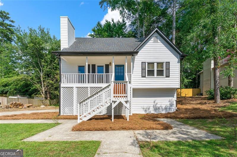 Welcome to this beautifully remodeled 5-bedroom, 3-bathroom home in the quiet and established Winchester Forest subdivision, just minutes from downtown Kennesaw. With no HOA and a host of modern updates, this home offers the perfect blend of comfort and convenience. Inside, you'll find brand new LVP flooring throughout, a new roof, a fully renovated kitchen, updated bathrooms, and a new deck ready for relaxing or entertaining. The spacious primary bedroom is located on the main level, while the living room features a cozy wood-burning fireplace and is filled with natural light. The home sits on a generous lot with both a large front and backyard, ideal for outdoor activities. Enjoy being just moments from popular local spots like Horned Owl Brewery, Lazy Guy Distillery, and Kennesaw State University, with quick access to major highways and the Atlanta airport for easy commuting or travel. 0PEN H0USE 8/2 2:00-4:00