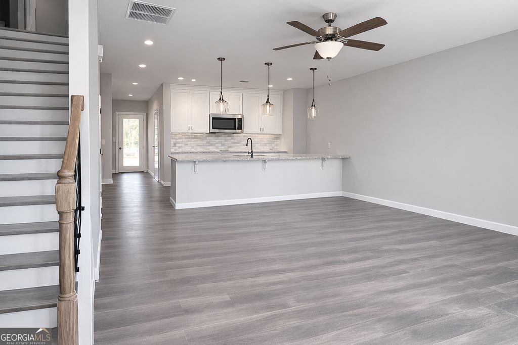 Photo of 220 Maddux Street #LOT 13, Fayetteville, GA 30214 (MLS # 10759026)