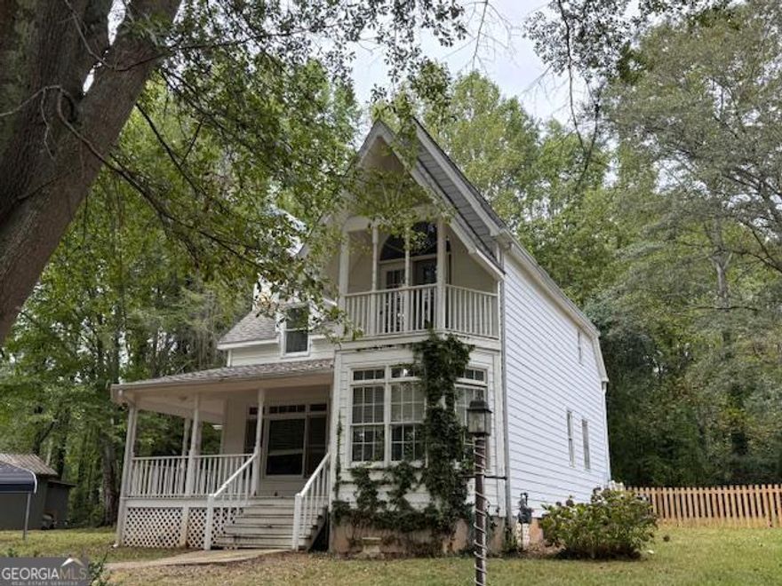 Tucked away at the private end of a quiet street in the heart of Cornelia, this inviting three-bedroom, two-and-a-half-bath home offers charm, space, and potential. A welcoming wrap-around porch sets the scene for relaxed mornings and evening gatherings, while inside, a cozy fireplace creates a warm and inviting focal point in the living area. The spacious dining room is ideal for entertaining, and the kitchen features brand-new stainless steel appliances, ready for your culinary creativity. Upstairs, generous bedrooms provide comfortable retreats, and the home's layout offers both functionality and charm. While it's ready to make your own with some fresh paint and new carpet, the location and setting make it an excellent opportunity to create the perfect in-town home with a private, tucked-away feel.