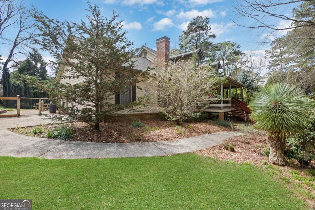 Photo of 5813 Four Winds Drive SW, Lilburn, GA 30047 (MLS # 10717838)