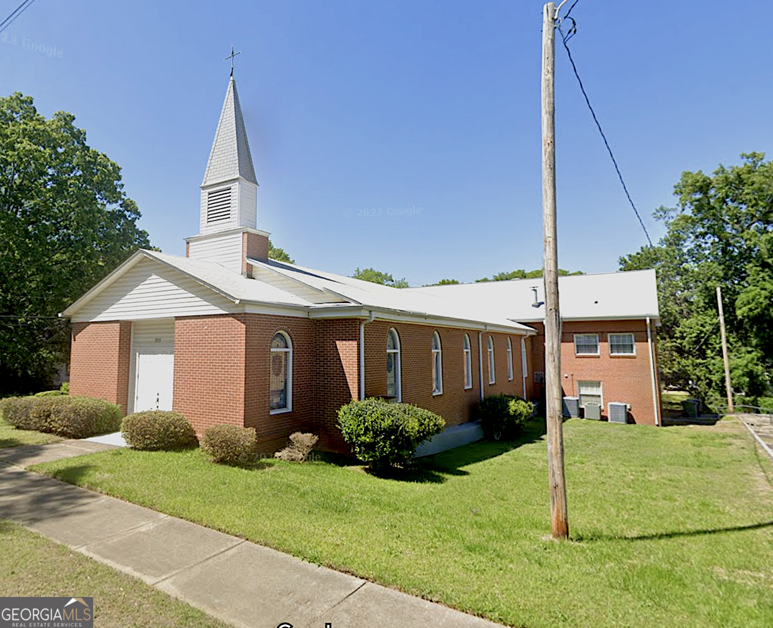 This beautiful church property consists of a sanctuary that comfortably seats approximately 185 people. The downstairs area features a large fellowship hall, a fully equipped kitchen, two bathrooms, one office, and a children's classroom, providing versatile spaces for events and activities. Upstairs, there are 11 spacious classrooms or offices and two additional bathrooms, perfect for educational programs or administrative use. There are 48 total parking spaces with 29 recently paved and striped spaces on the side and 19 spaces in the back.