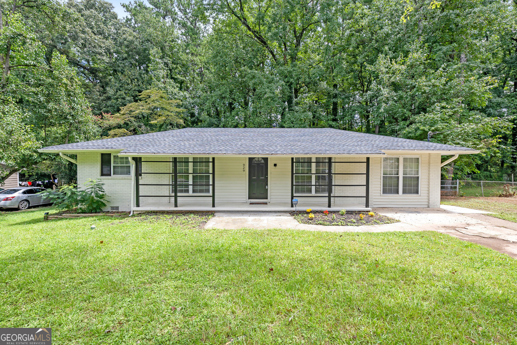 Fully renovated 4 Bedrooms 3 Full Baths ranch in Creekdale Estates, Priced to Sell! Quick access to I-285, Emory/CDC, Decatur, Avondale Estates, and steps from the PATH trail. No HOA. One of the most complete renovations in the area offering single level living with a bright, open-concept floor plan, modern finishes, and essential upgrades completed. Enjoy beautiful hardwood flooring, an electric fireplace, and a spacious kitchen featuring quartz countertops, smart stainless steel appliances, and a large island with seating. Bathrooms fully updated with tiled waterfall showers and modern vanities. Includes a new roof, new HVAC, spacious laundry room, custom closets, upgraded lighting, fenced private backyard with patio, and detached shed with a ton of potential. Whether you're working from home, growing your family, or looking to downsize with ease, this home checks all the boxes! Take a closer look and schedule your showing today!