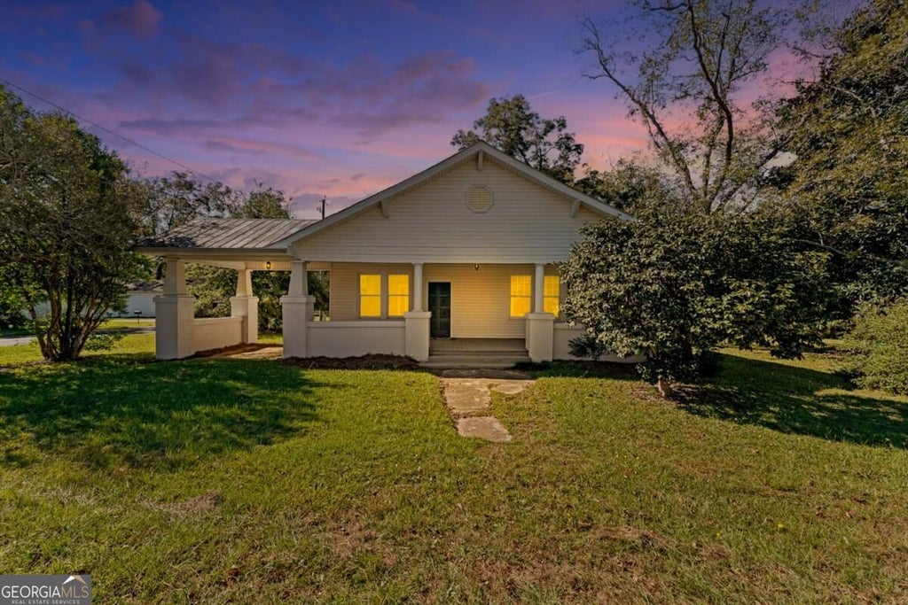 Photo of 818 5Th Avenue, Twin City, GA 30471 (MLS # 10878859)