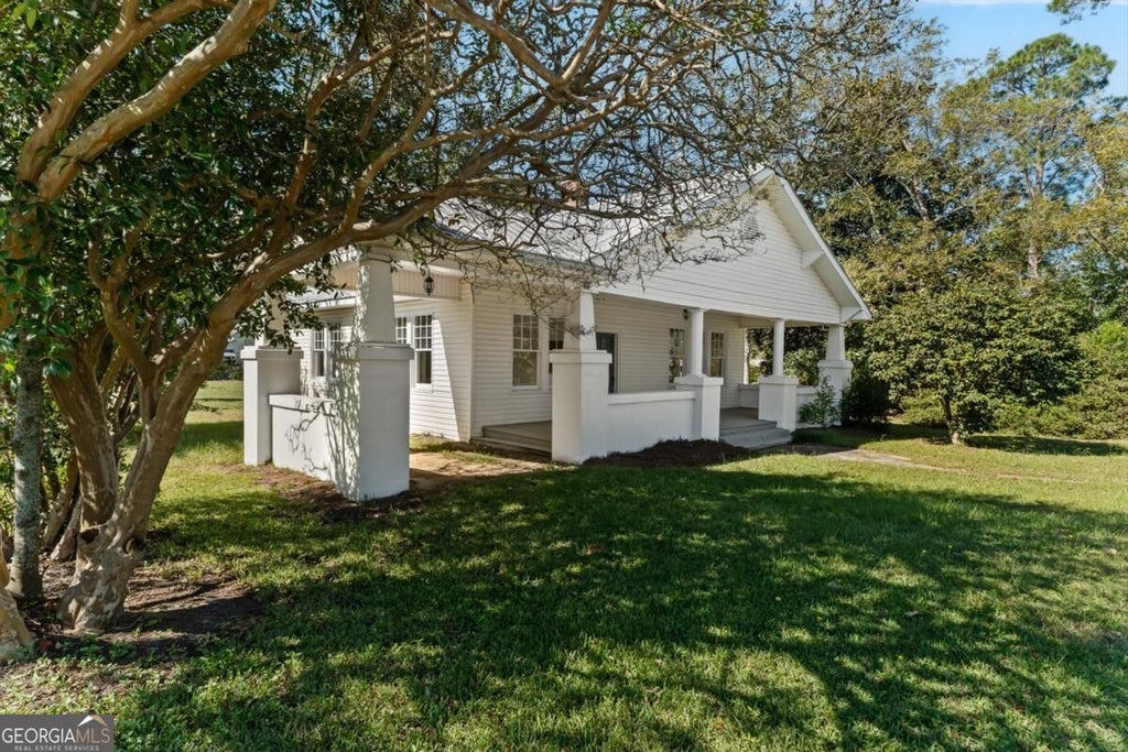 Photo of 818 5Th Avenue, Twin City, GA 30471 (MLS # 10878859)
