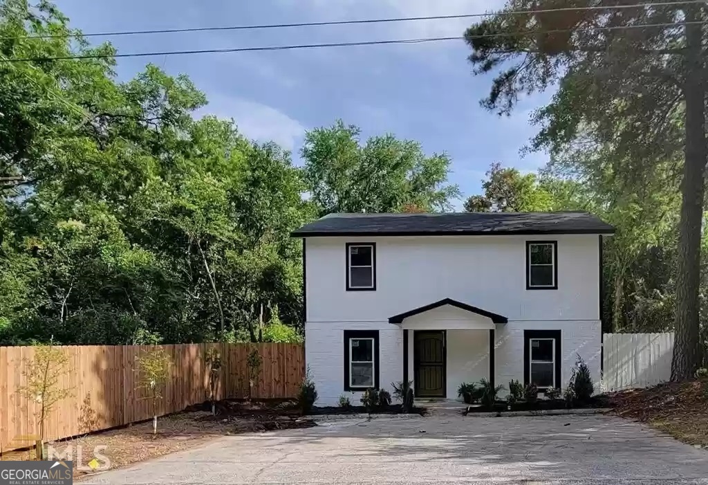Are you ready for a home to call your own? Look no further than this two-story, 4-bedroom, 2-bathroom home offering 1800sqft of comfort. Enjoy a peach from your own tree greeting you in the front yard. The no-fuss but spacious open floor plan boast brand new carpet throughout the whole house. The simple living room and family room contrast the character of the exposed brick-walled kitchen/dining room combo, adding warmth and texture. The unique river rock-topped breakfast bar seating area creates a cozy space for casual meals or morning coffee. The backyard is perfect for entertaining and awaits your next backyard bar-b-que. Did I mention the downtown Macon business district, Mercer University, and medical facilities are less than 10 mins away? Make your offer today! Verify listing details prior to purchase.