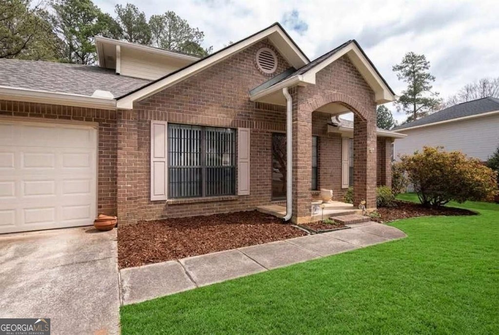 Photo of 1980 Hunters Ridge Drive, Lawrenceville, GA 30044 (MLS # 10850895)