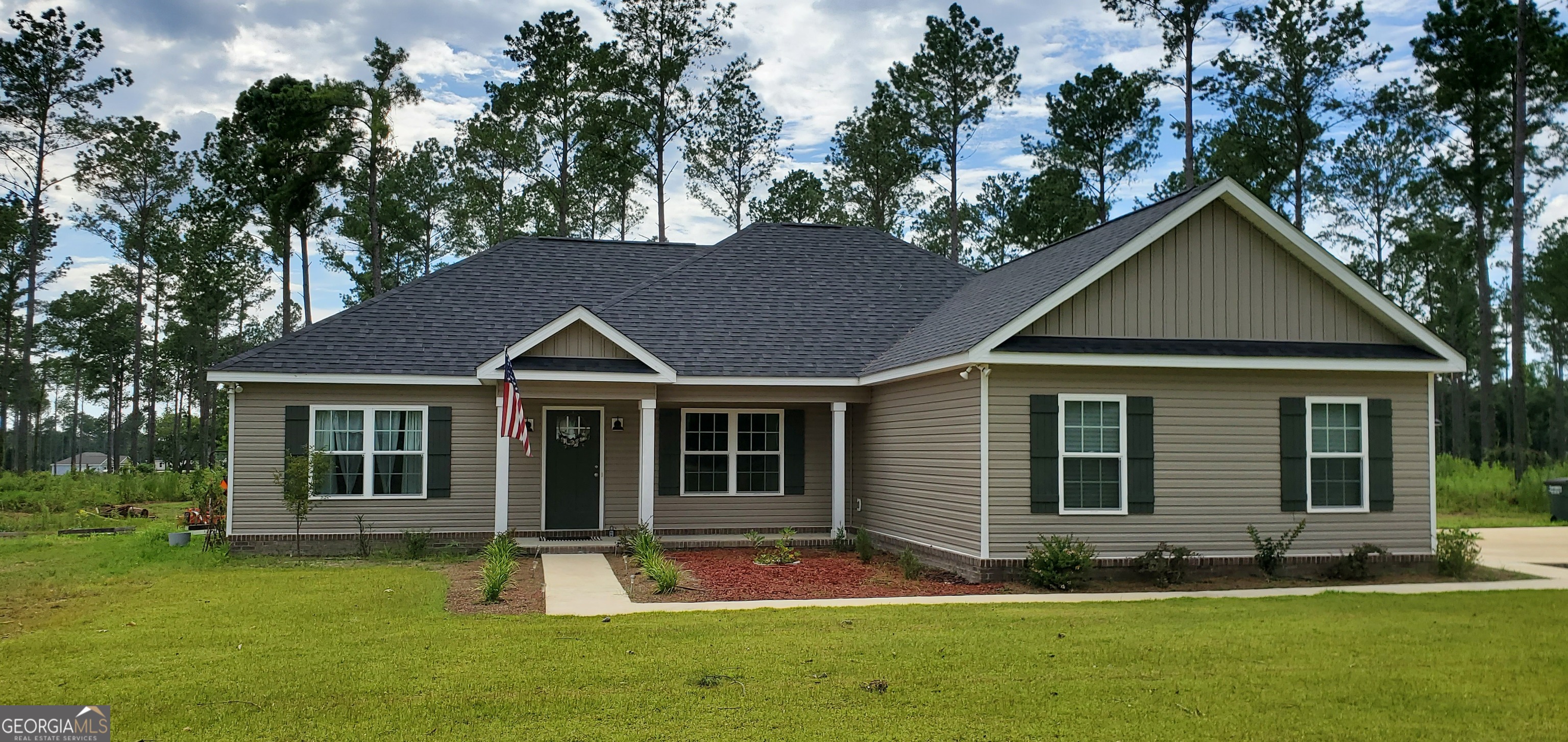 Motivated Sellers!! Great location for country living. Built in 2024 this home offers the perfect blend of modern living with a rural charm. Situated on a sizable 4.25 acre lot, this home is approx. 1600 heated sq. ft. boasting 3 bedrooms/ 2 bathrooms. Step inside to discover a spacious split floor plan connecting the living room and dining with the kitchen, making this home ideal for entertaining. Kitchen featuresstainless steel kitchen appliances, breakfast bar, and spacious cabinetry with ample countertop space. Enjoy the privacy and peacefulness of the country in your oversized backyard. Property has a private well. Call Terri Bell at 478-494-1663 for more information.