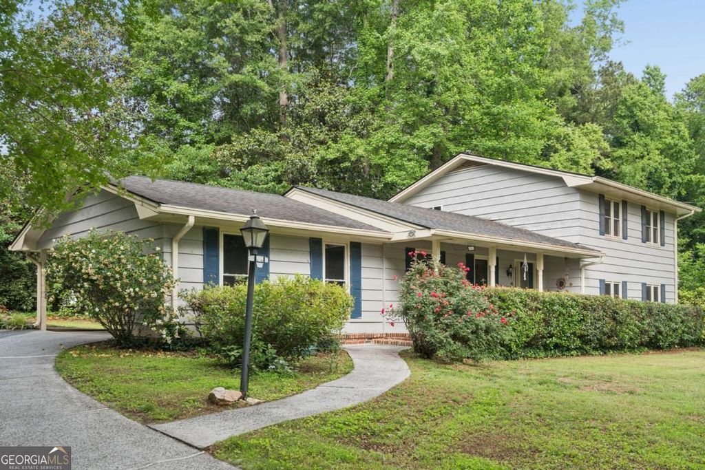 Photo of 441 Village Green Court SW, Lilburn, GA 30047 (MLS # 10774060)