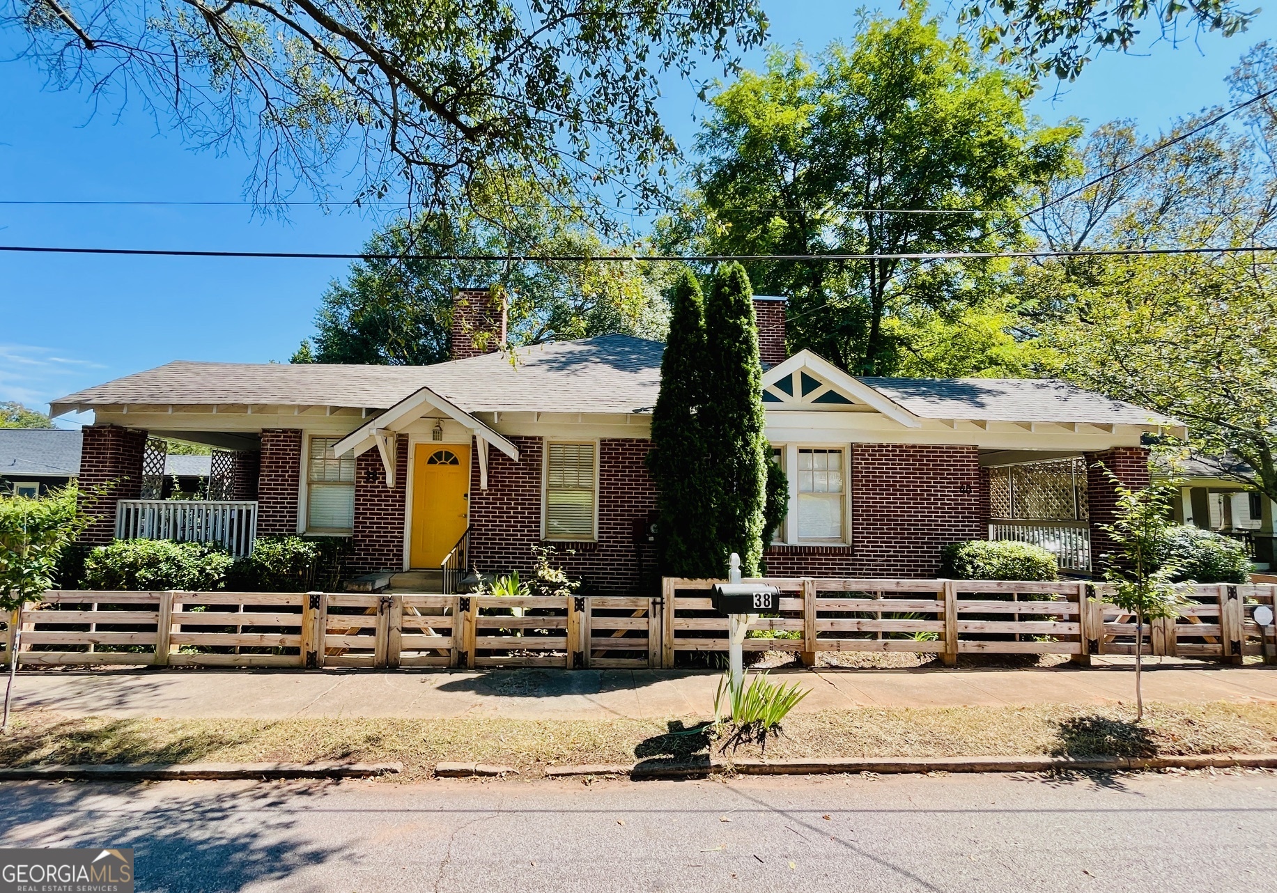 Don't miss this Rare Opportunity to own this well maintained duplex in the heart of Kirkwood! Each brick one-bedroom, one-bath unit showcases classic charm with hardwood floors, a decorative fireplace, an updated kitchen, updated paint colors, a separate dining area or flex space, a washer/dryer area, and a private covered porch. This versatile property is perfect for living on one side while renting or Airbnb-ing the other. Utilities are separately metered, except for water. Situated just a few blocks from downtown Kirkwood's vibrant shops and restaurants. Double the charm, double the opportunity-live, rent, or invest in this ideal duplex! (officially 38 & 40 Bates Ave. SE)
