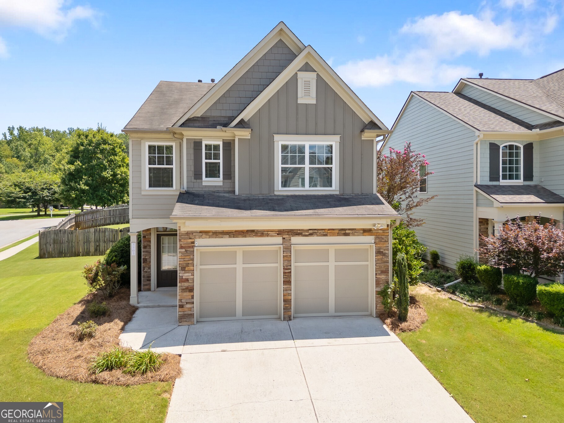 Welcome to this well-loved 3 bed / 2.5 bath home in the sought-after Stonehaven Pointe community one of North Forsyth's most amenity-rich neighborhoods. Nestled on a generous, corner lot, this home combines comfort, space, and convenience in a location that's hard to beat. Inside, you'll find fresh paint throughout, soaring ceilings, and a cozy fireplace that makes the living room instantly inviting. Full HVAC replaced in 2024 and new water heater in 2023. The kitchen offers plenty of cabinet space, and a cheerful breakfast nook that overlooks the fully fenced backyard. Upstairs, the oversized primary suite includes a walk-in closet and spacious en suite with double vanities, soaking tub, and separate shower. Two secondary bedrooms are ideal for guests, kids, or a home office setup. But what truly sets this home apart? The neighborhood. Stonehaven Pointe is a destination all its own featuring an Olympic-size pool, water slide, splash pad, multiple tennis courts, state-of-the-art gym, clubhouse, and even a dog park. Whether you're looking to beat the heat, join a tennis league, or just take an evening stroll, there's something here for everyone.