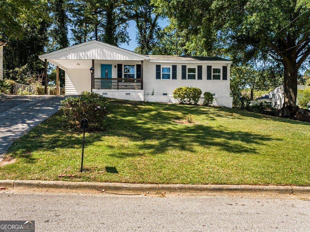 Photo of 6371 Westbury Road, Riverdale, GA 30274 (MLS # 10817053)
