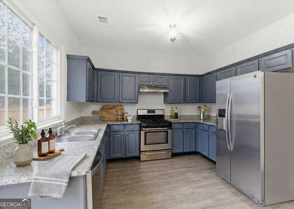 Photo of 5965 Barrington Lane, Johns Creek, GA 30005 (MLS # 10700340)