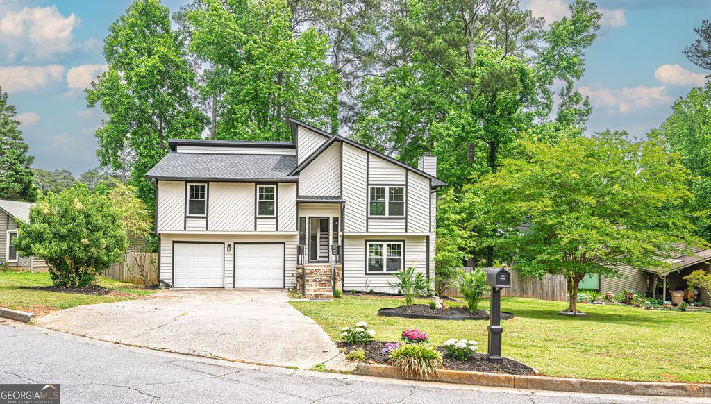 Photo of 10175 Old Woodland Entry, Johns Creek, GA 30022 (MLS # 10767939)