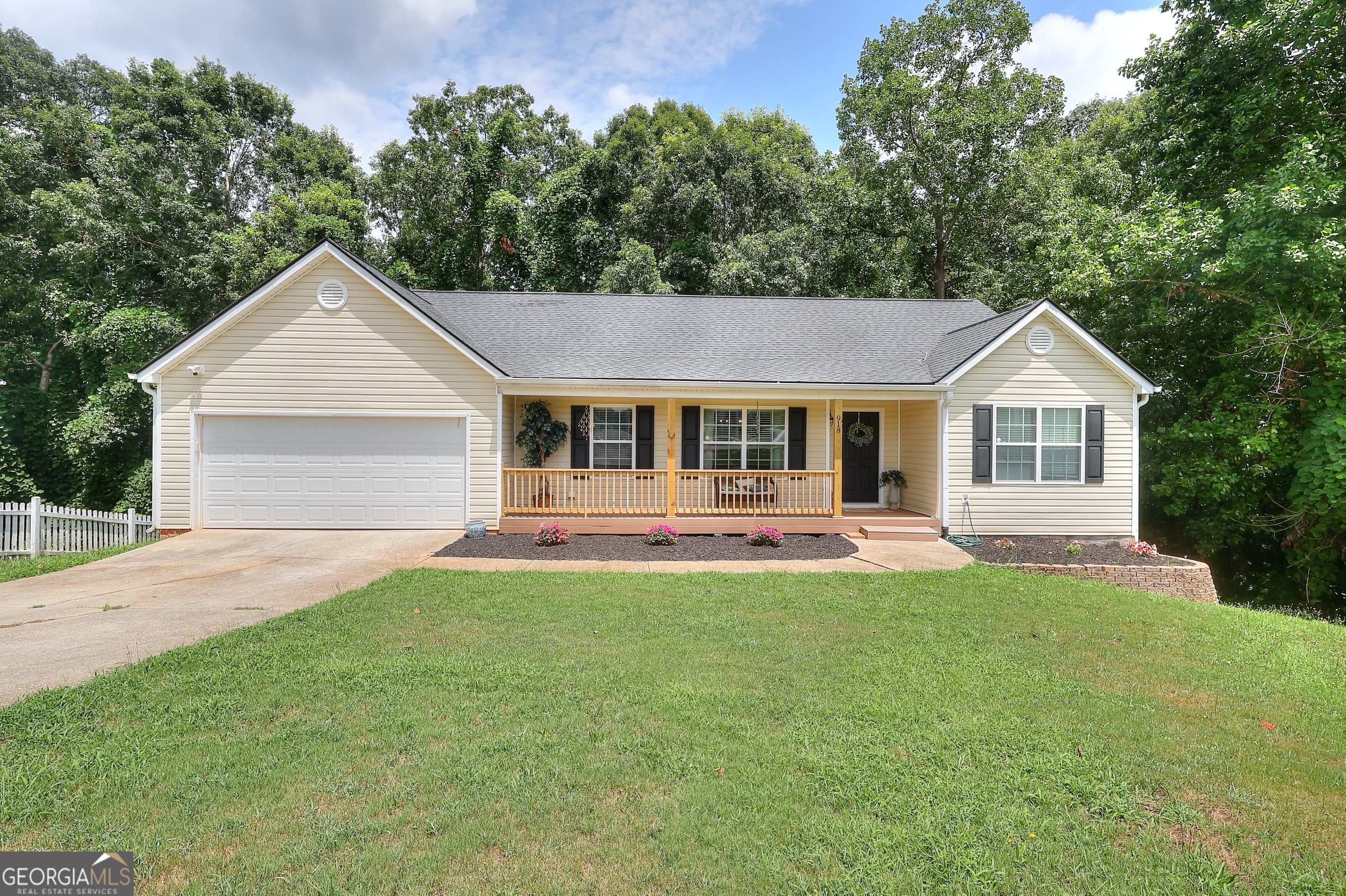 Welcome home to this charming stepless ranch easy living at its finest! This home offers a roomy, open-concept layout with a separate dining space that's perfect for gathering with friends or hosting family dinners. You'll love the roommate-friendly floor plan, giving everyone their own space and privacy. The large laundry room comes with built-in shelving and yes, the washer and dryer stay! Enjoy your morning coffee on the inviting front porch, and soak up the peaceful vibes of your wooded backyard your own little nature escape. No HOA means more freedom and flexibility for how you live. Plus, the full, unfinished basement is just waiting for your personal touch storage, workshop, or future finished space