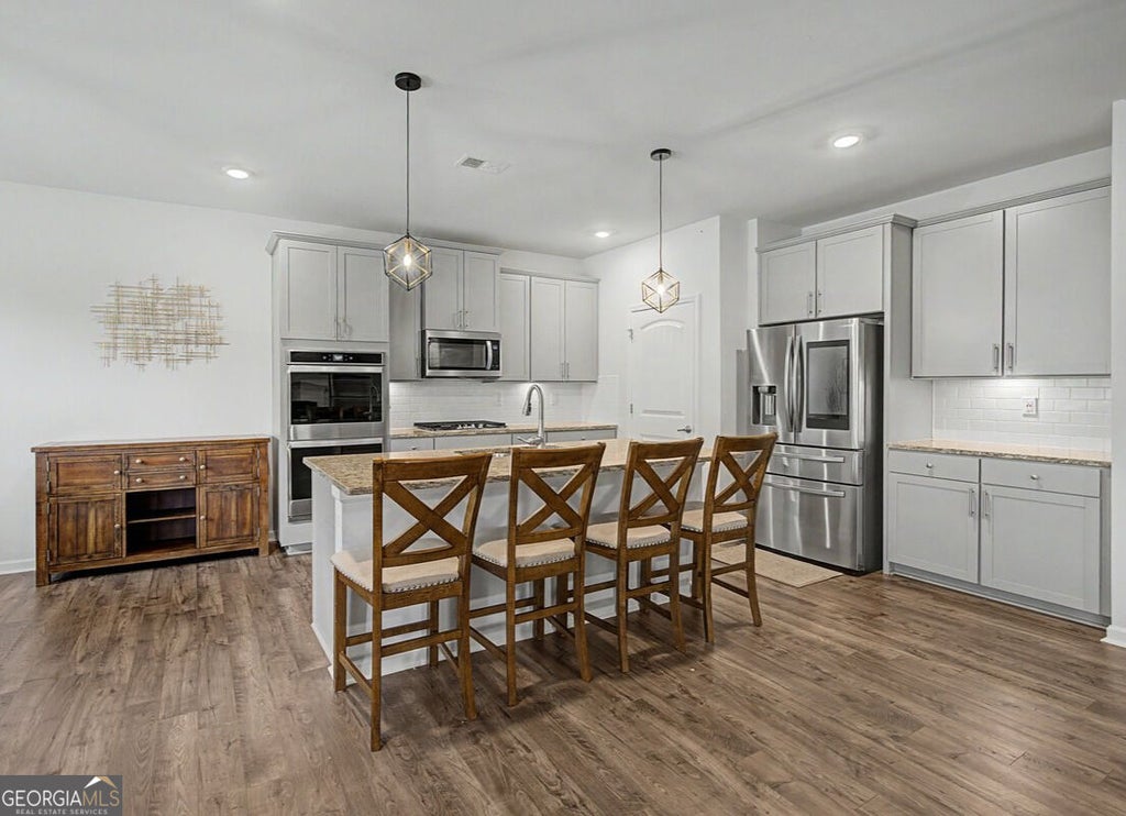 Photo of 7442 Jennadee Drive, Fairburn, GA 30213 (MLS # 10819415)