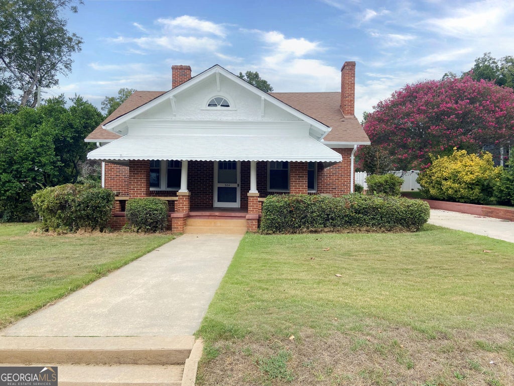 Photo of 304 FORSYTH ST. ST, BARNESVILLE, GA 30204 (MLS # 10867329)