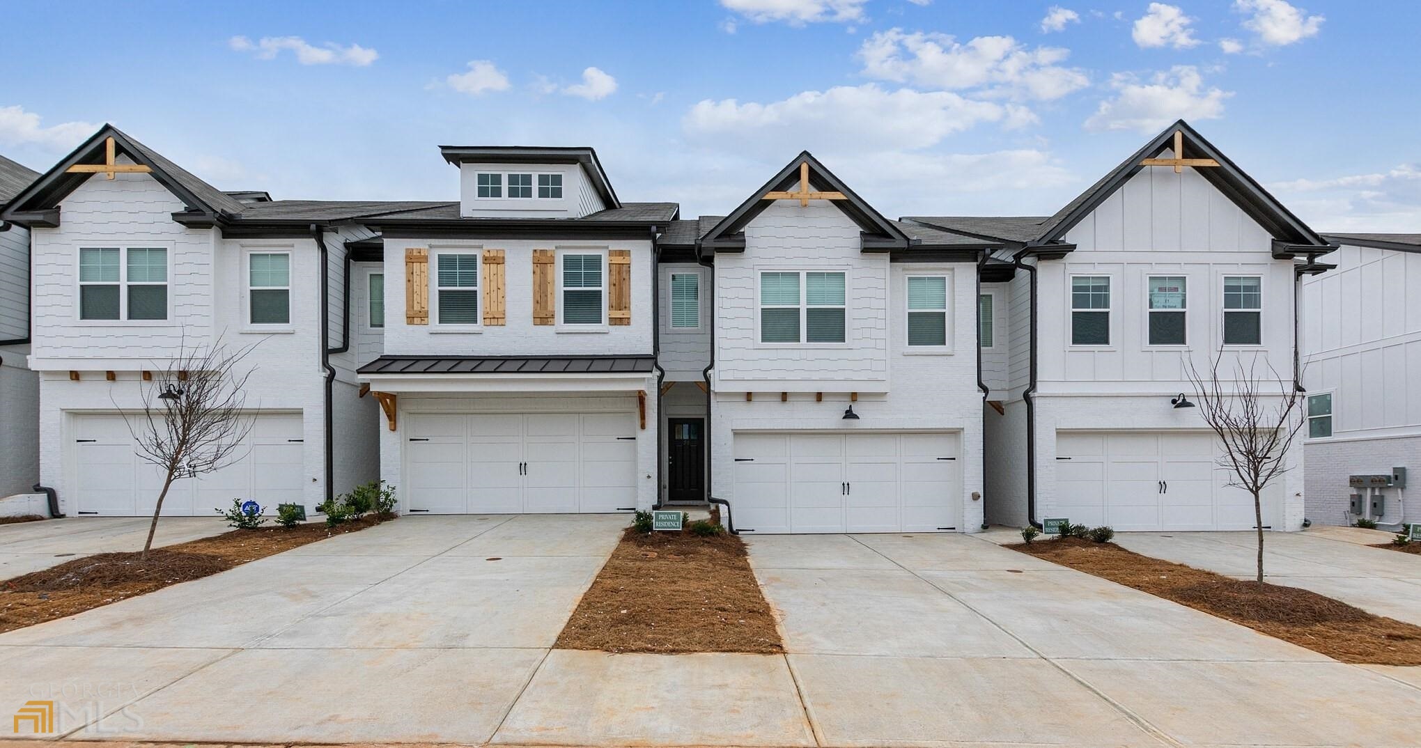 UP TO $7,500 IN CLOSING COSTS WHEN FINANCING WITH OUR PREFERRED LENDER, D.C. AIKEN WITH BANKSOUTH MORTGAGE. Pristine, WHITE CABINETRY THRU-OUT, Modern Farmhouse w/Loft Flex Space. Live a Maintenance Free Life or Expand Your Investment Portfolio! All Homes in Cannon Trace Provide Two Car Garages. Modern Floor Plan, Upscale Finishes ... Quartz, Tile, Hardwoods ... Big Island, Walk-In Pantry ... Fireplace that Warms and Glows with the Flick of a Switch! Oversized Primary Suite with Double Vanity, Separate Shower, Soaking Tub. Pool with Cabana and Dog Park. (Pictures are of the Hanover floor plan with different finishes. This Home is White Cabinetry Thru-out)