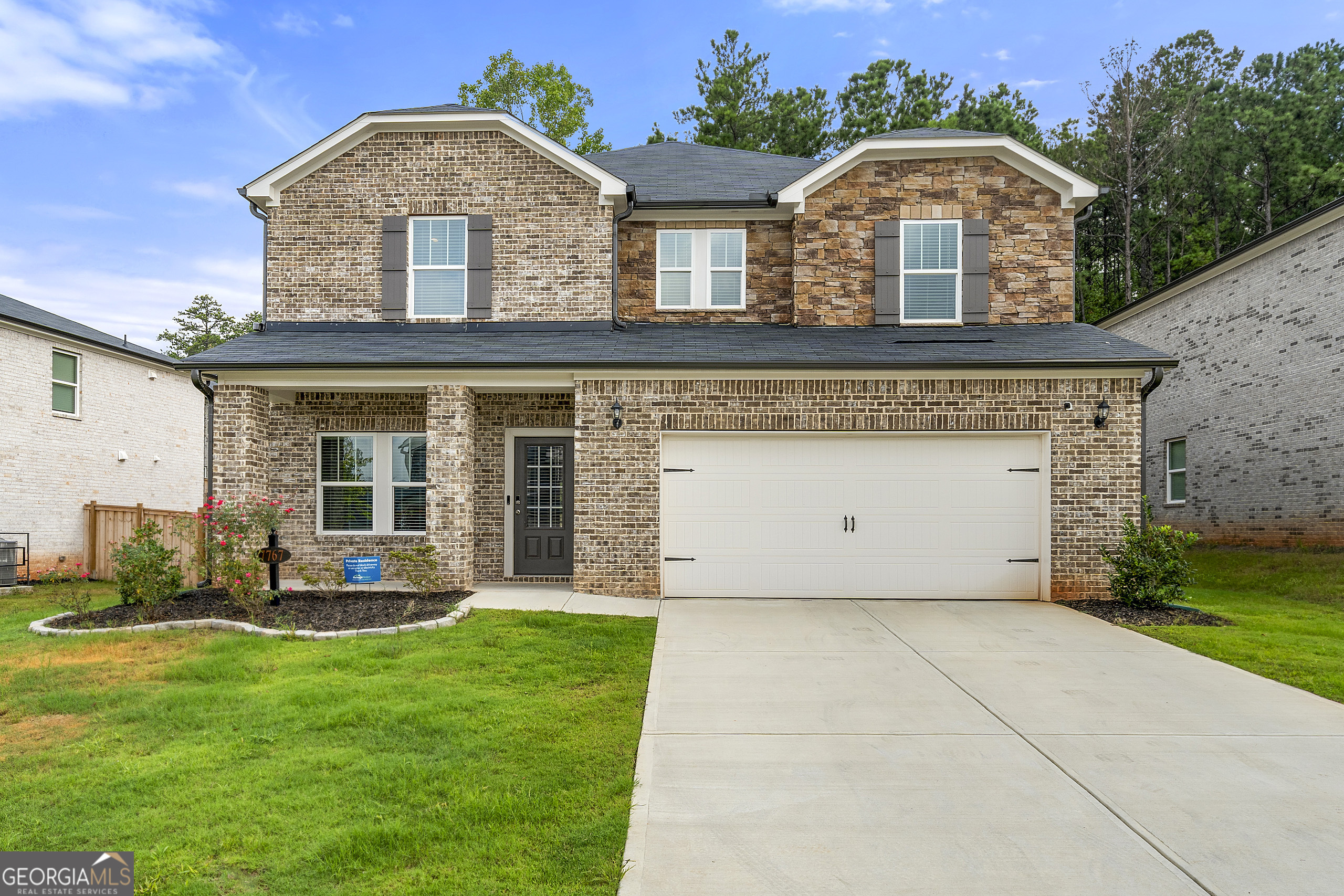 Welcome to 7767 Richmond Trail, an elegant Fairburn residence listed at $419,900. This thoughtfully designed home showcases an open concept with a versatile flex space, expansive living room, and a chef's kitchen adorned with granite countertops, a large island, and stainless steel appliances. The upper level features four spacious bedrooms, including a sophisticated primary suite with a private sitting area, spa-inspired bath with dual vanities, soaking tub, separate shower, and walk-in closet. A fenced backyard offers privacy and tranquility. Ideally located near downtown Fairburn with easy access to major highways. Seller is highly motivated.