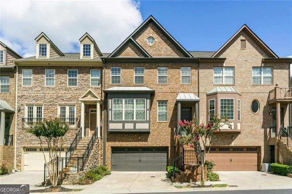 Photo of 9034 Woodland Trail, Alpharetta, GA 30009 (MLS # 10825687)